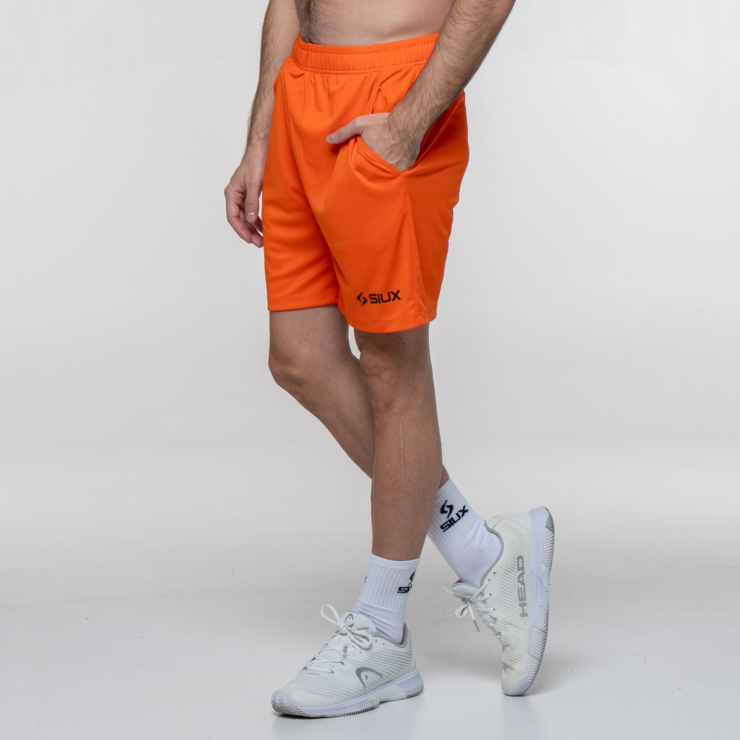 SIUX Club Orange Shorts detail - Onyx & Bloom Sports