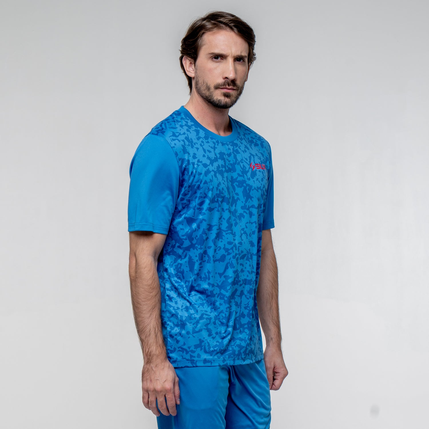 SIUX Cyber Blue Shirt model view - Onyx & Bloom Sports