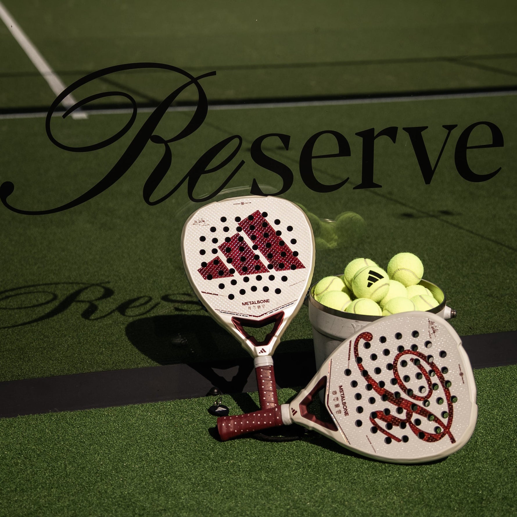 Adidas Metalbone Reserve 2026 racket on court - Onyx & Bloom Sports